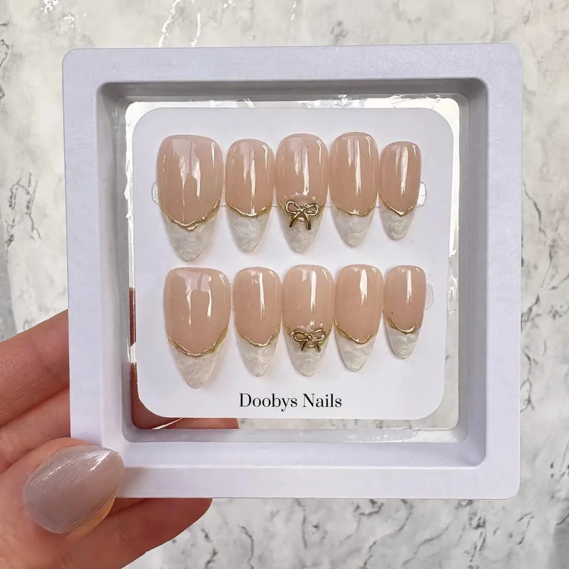 Nude French Gold Bow Almond